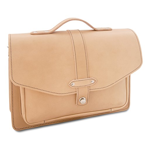 Cartera de mujer en cuero beige, hecha a mano por el artesano alemán Thielemann, ideal como bolso de trabajo para un estilo elegante y natural.